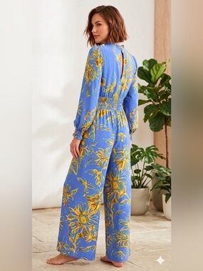 ODDI Boho NWOT Sunburst
Floral Jumpsuit Wide Leg
Smocked Waist keyhole back Sz S